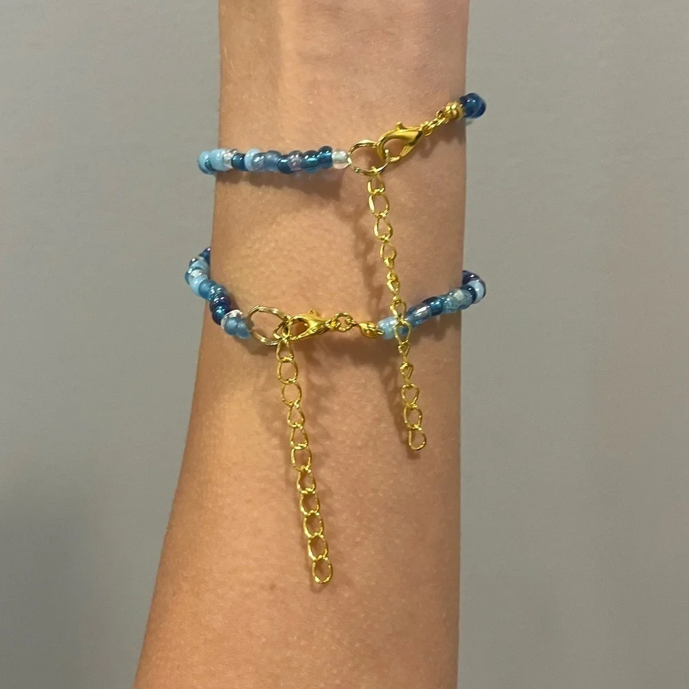 Handmade pack of matching blue beaded bracelets beach theme gold turtle starfish